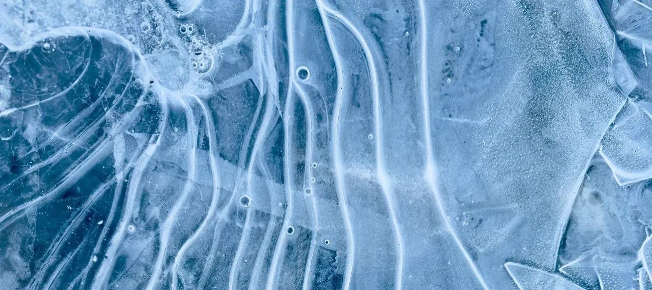 Blue and white patterns in ice, structure repeating at every scale